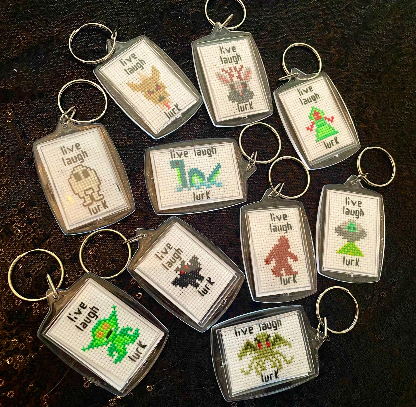 Cross Stitch Live Laugh Lurk Cryptid Keychains